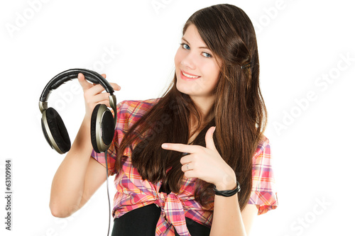a smiling girl shows a finger on headsets