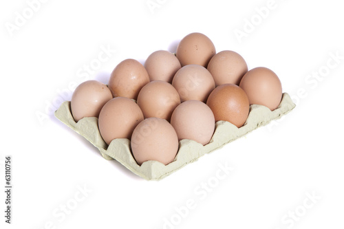 Twelve eggs in a dozen eggs cardboard