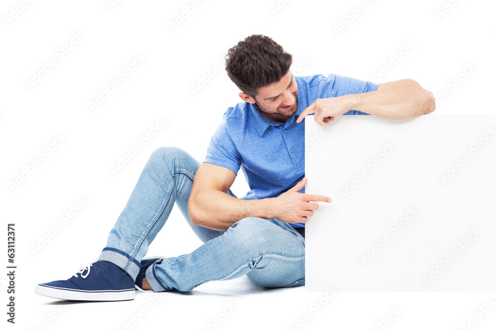 Sitting man with empty poster