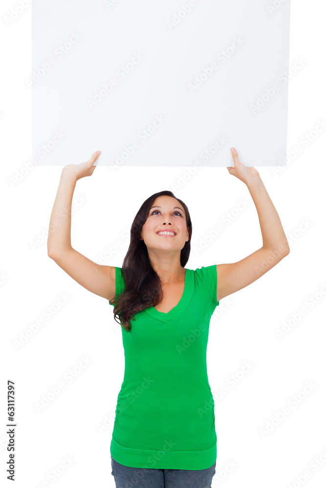Beautiful caucasian woman holding a blank sign Beautiful caucasian woman holding a blank sign
