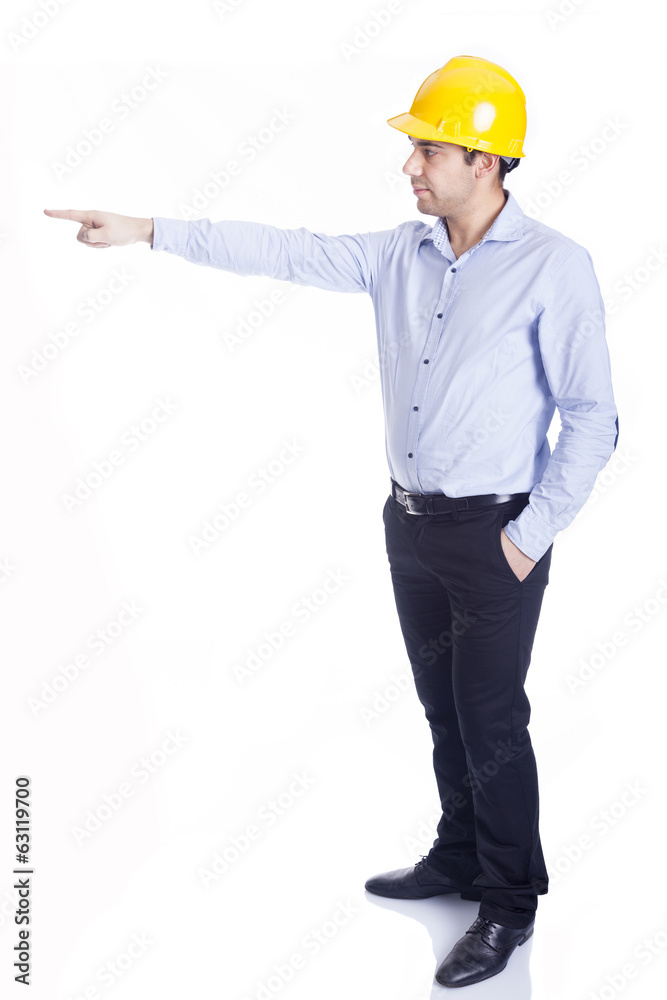 Engineer pointing at something, isolated on white Engineer pointing at something, isolated on white