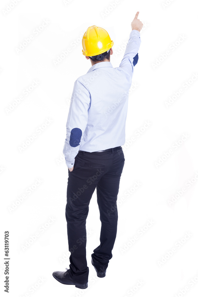 Engineer pointing at something, isolated on white Engineer pointing at something, isolated on white
