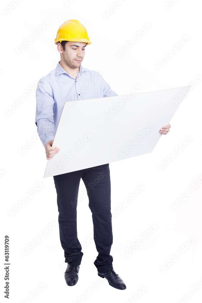 Handsome engineer holding blueprints, isolated on white Handsome engineer holding blueprints, isolated on white