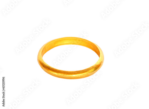couple of gold wedding rings on white background