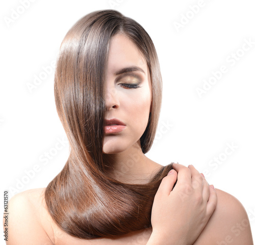 Beautiful young woman with long hair isolated on white