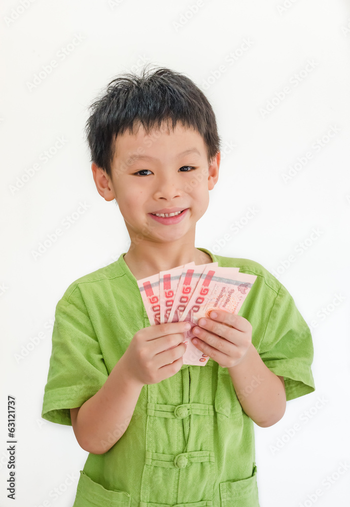 Asian boy thinking with holding Thai money on hand over white ba Asian boy thinking with holding Thai money on hand over white ba