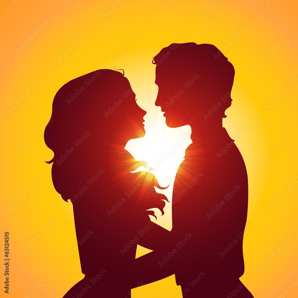 Sunset silhouettes of kissing couple Sunset silhouettes of kissing couple