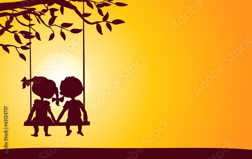 Sunset silhouettes of boy and girl