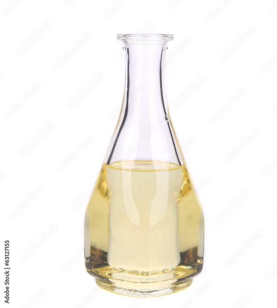 Glass bottle full with oil. Glass bottle full with oil.