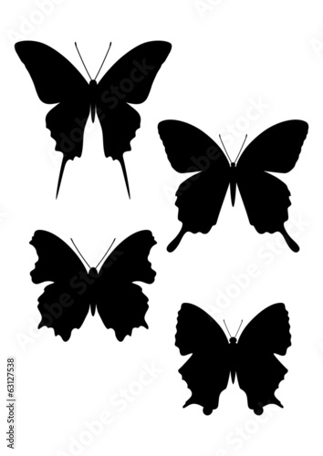 set of silhouettes of butterflies