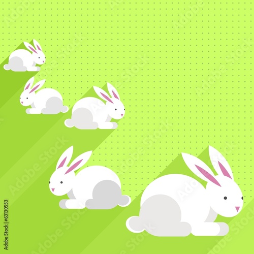 białe zające na zielonym tle Wielkanocna ilustracja