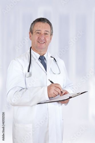 Senior doctor with clipboard