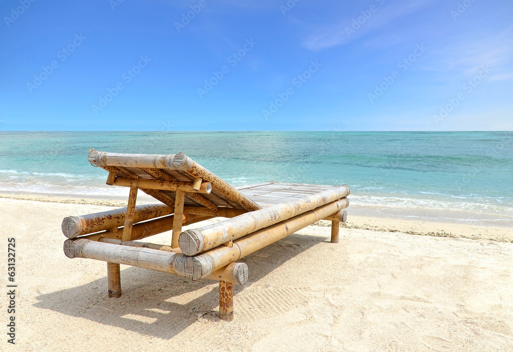 Relaxing Chair on white sandy Beach