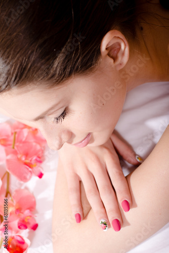 spa treatment  beautiful woman with flower