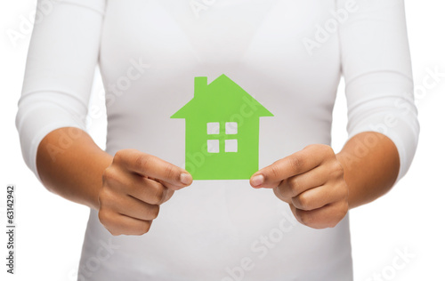 woman hands holding green house