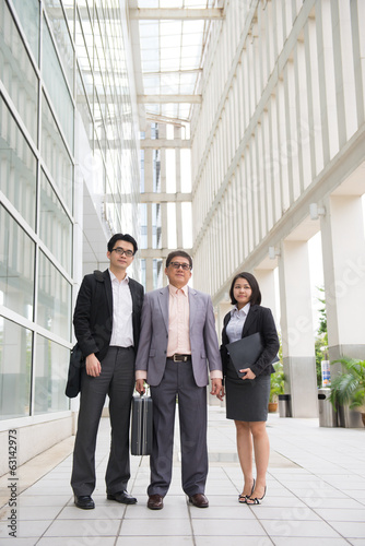 asian business team in office background