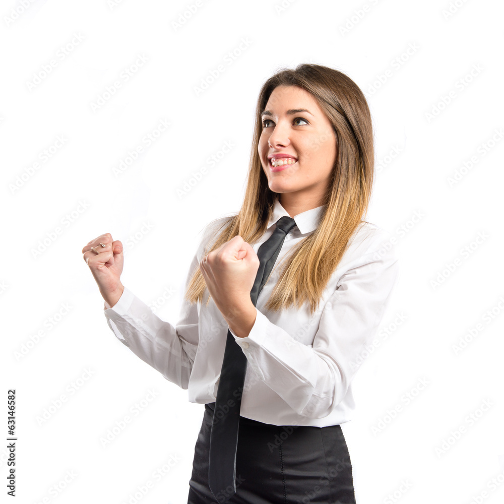 Young businesswoman winning over white background Young businesswoman winning over white background
