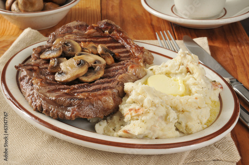 Rib steak and potatoes