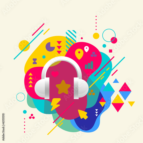 Headphones on abstract colorful spotted background with differen