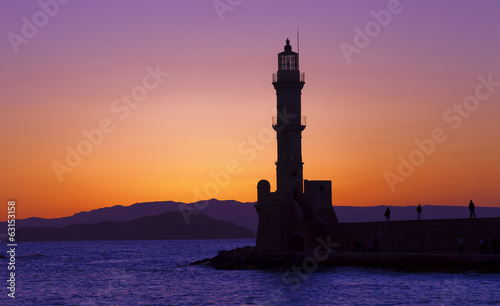 Hania harbor with lighthouse at sunset, Crete, Greece
