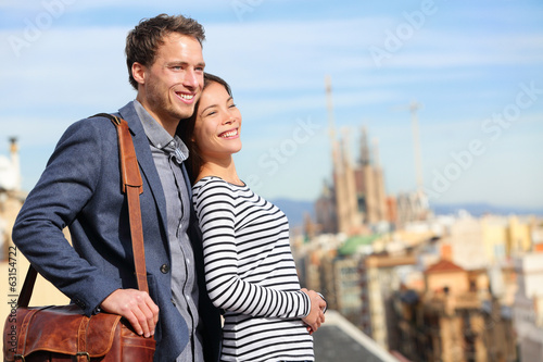 Photography Happy romantic couple looking at view of Barcelona