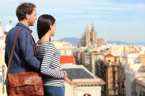 Barcelona - romantic couple looking at city view photo