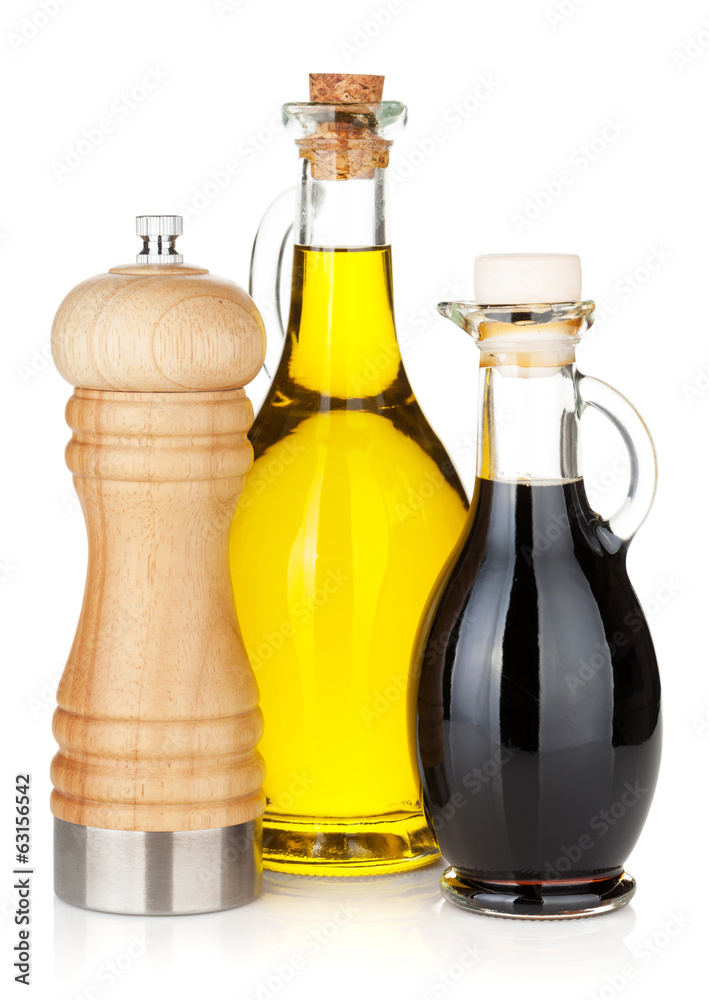 Olive oil and vinegar bottles with pepper shaker Olive oil and vinegar bottles with pepper shaker