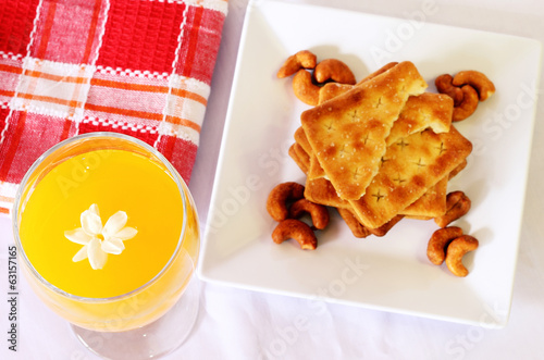 Fresh orange juice with crackers