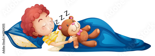 A young boy sleeping