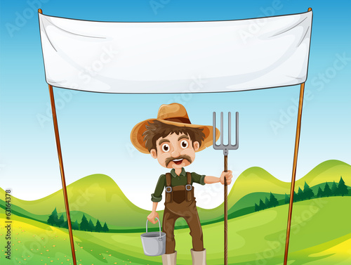 A farmer below the empty signage