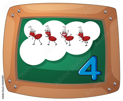 A blackboard with four ants
