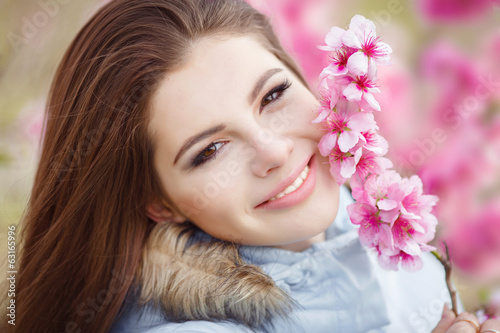 Happy teenager girl at green spring nature © armina