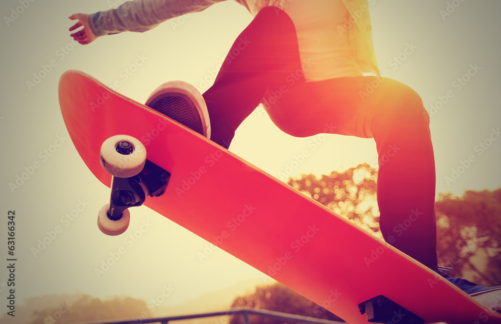 Wall Mural skateboarding at sunrise skate park