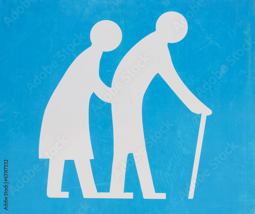 Foto Street signboard - old people crossing road