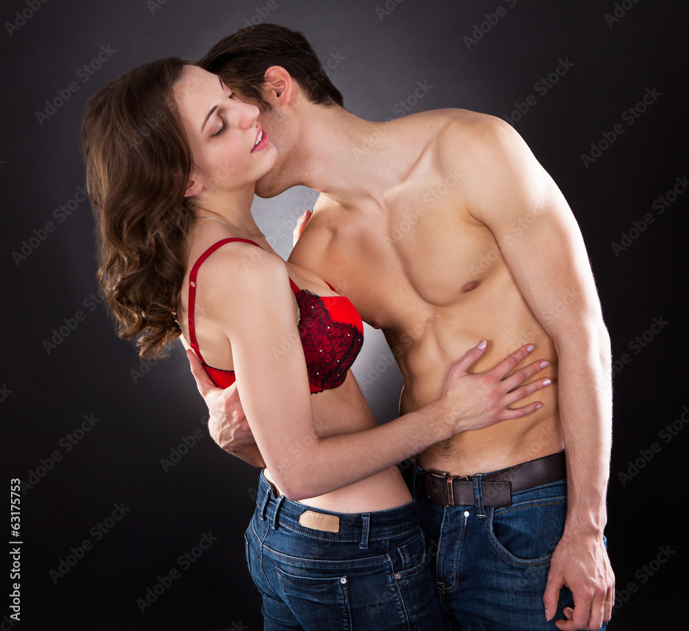 Passionate Man Kissing Woman's Neck