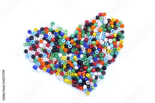 Colorful beads heart shape isolated on white background