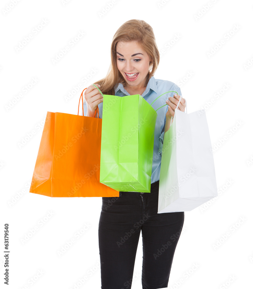 Surprise Woman Looking In Shopping Bag Surprise Woman Looking In Shopping Bag
