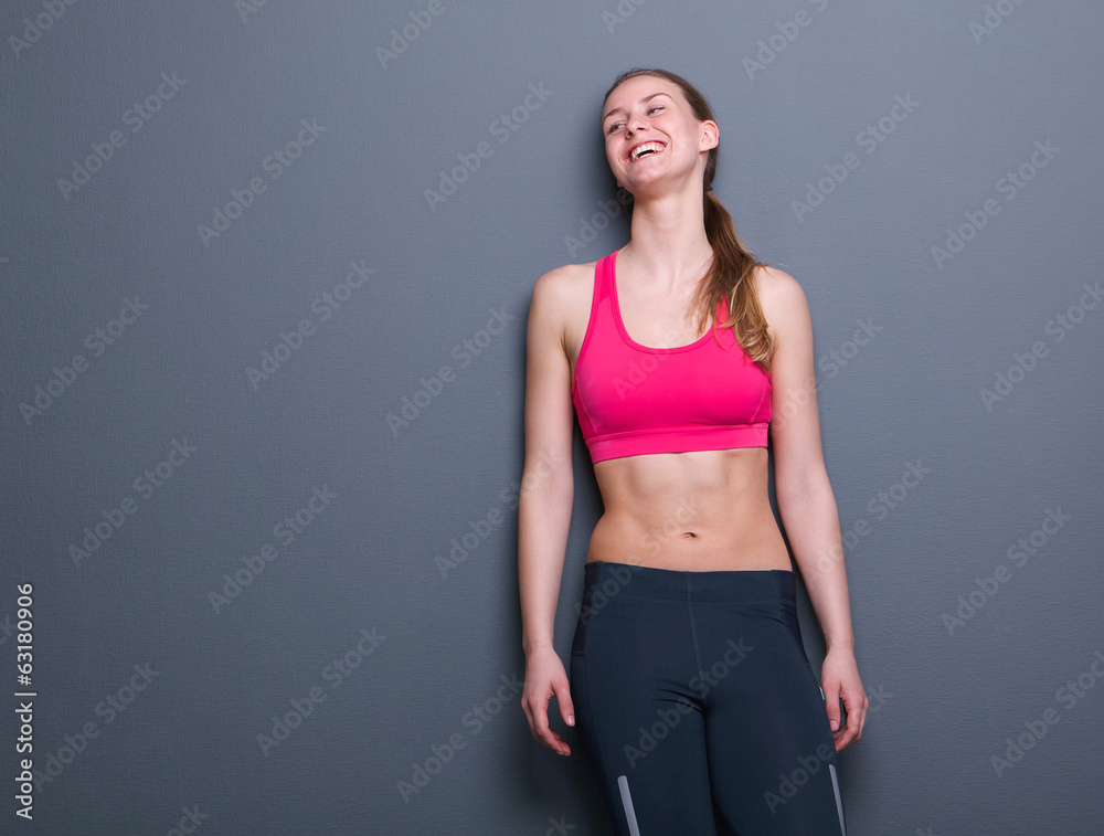Happy young woman in sports clothing Happy young woman in sports clothing