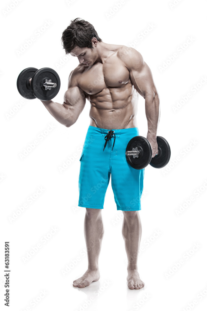 Muscular bodybuilder guy doing exercises with dumbbells over whi Muscular bodybuilder guy doing exercises with dumbbells over whi