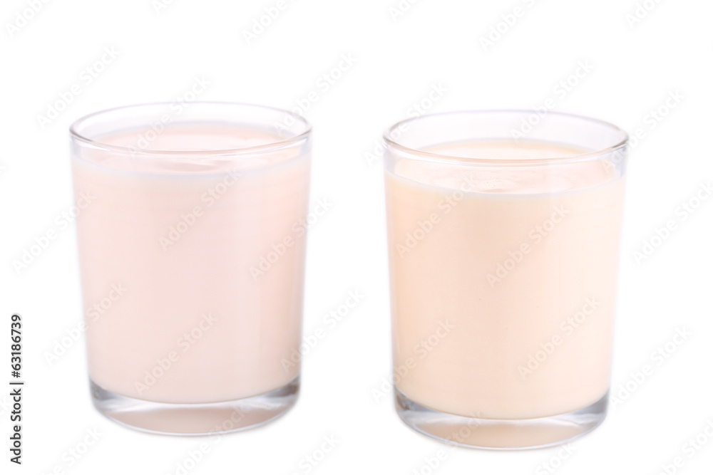 Delicious yogurt in glasses isolated on white Delicious yogurt in glasses isolated on white