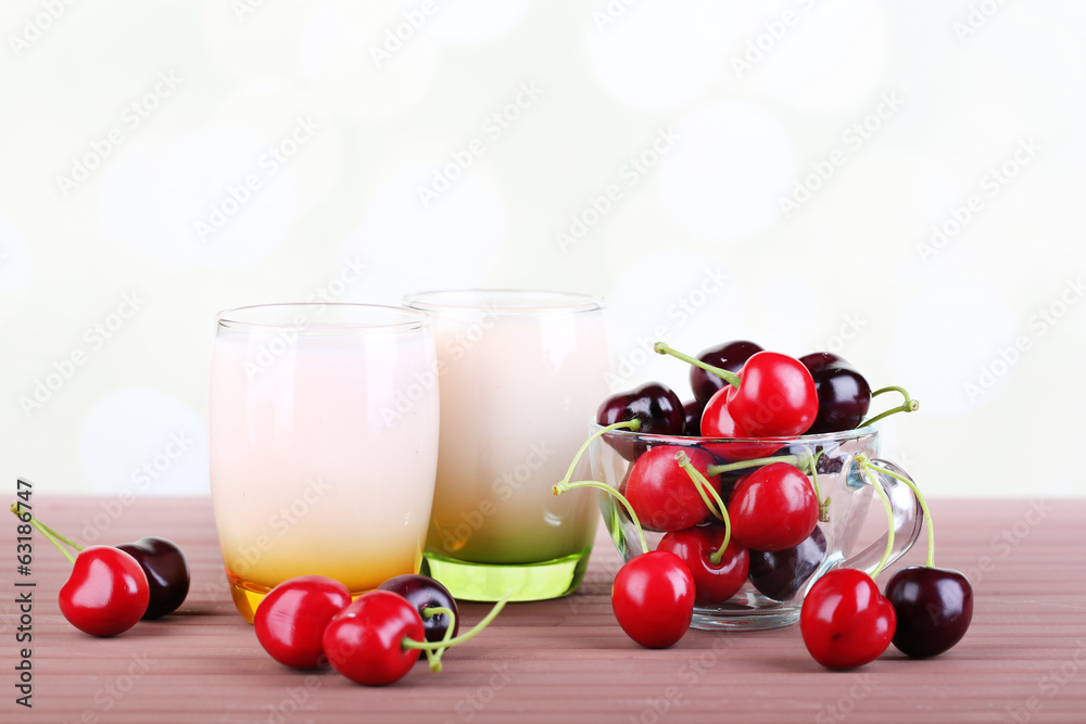 Delicious yogurt with fruits tastes in glasses and fresh fruits Delicious yogurt with fruits tastes in glasses and fresh fruits