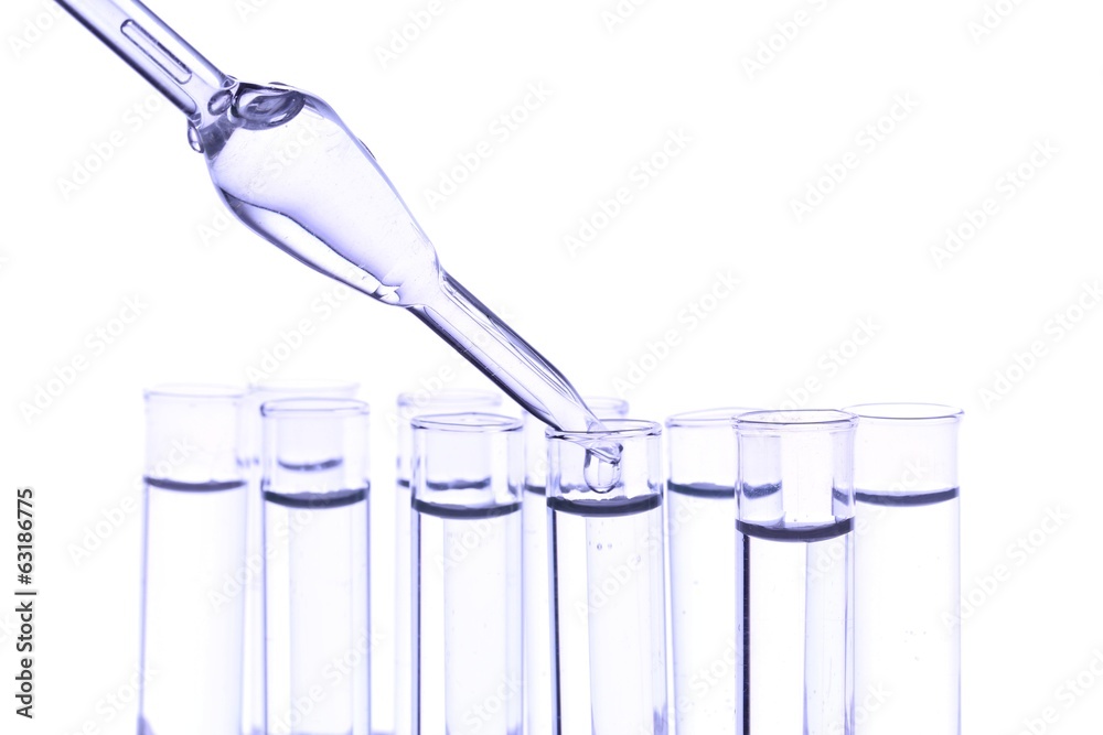 Dropper and test tubes, close up, isolated on white Dropper and test tubes, close up, isolated on white