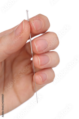 Hand holding needle for acupuncture
