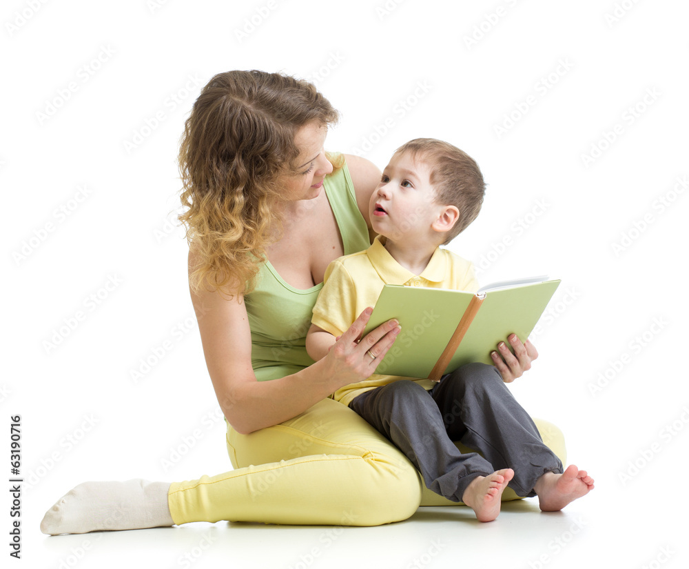 mother reading a book to her kid boy mother reading a book to her kid boy