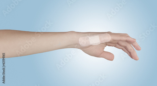 Adhesive Healing plaster on finger. © Lovrencg