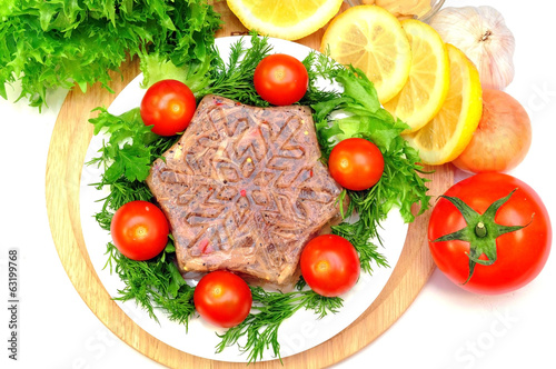 Aspic from meat with lemon, mustard and fresh vegetables