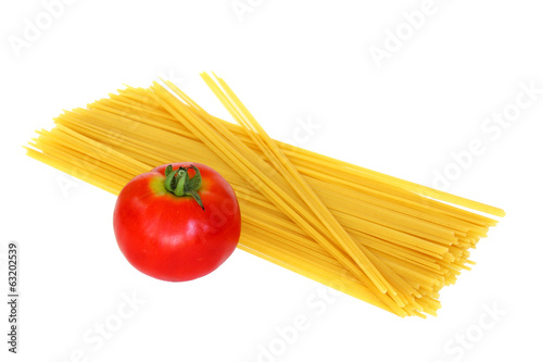 tomato and raw pasta on white background