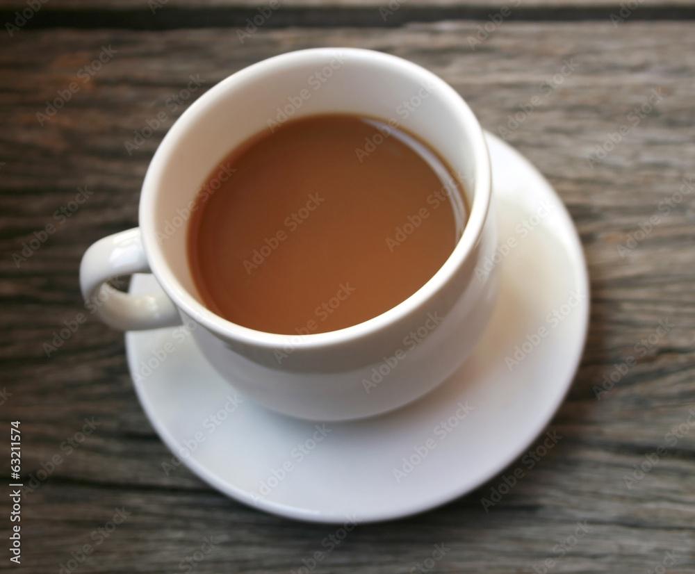 coffee in a white cup on wooden coffee in a white cup on wooden