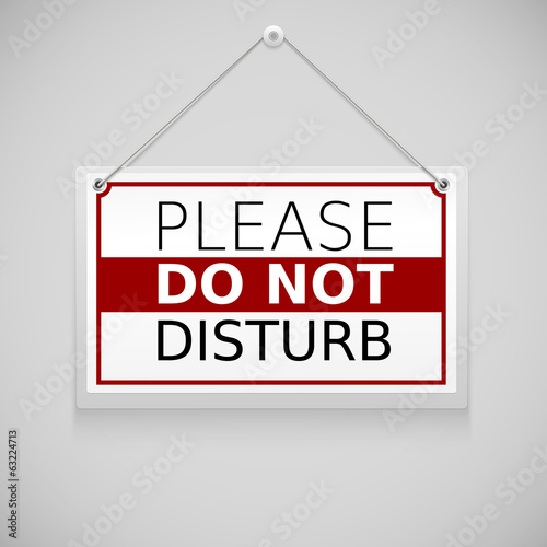 Please do not disturb, sign hanging on the wall