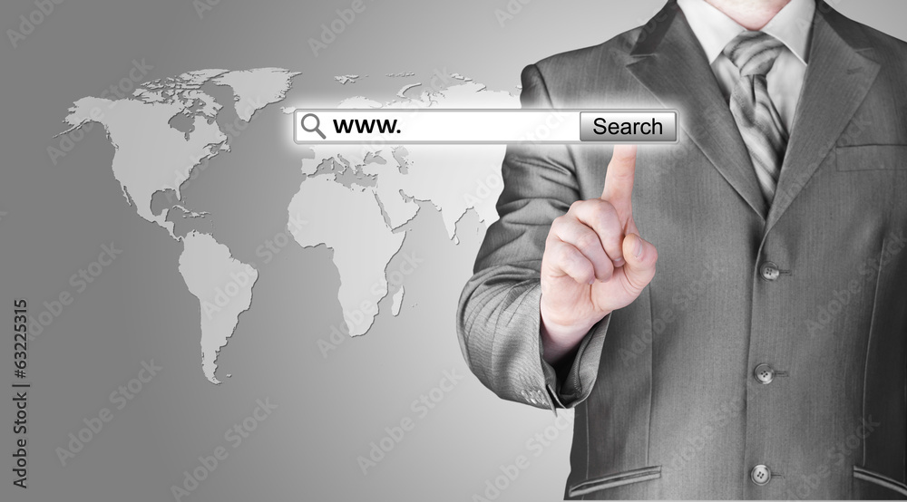 Businessman pushing virtual search bar Businessman pushing virtual search bar